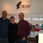 Chad Sniffen and David Lee with Casey Keene of VAWnet at the Pennsylvania Coalition Against Domestic Violence